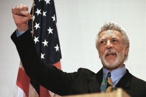 In this Nov. 17, 1997 file photo Democratic Rep. Ron Dellums raises his fist while announcing his retirement from Congress at a news conference in Oakland, Calif. Dellums, a fiery anti-war activist who championed social justice as Northern California&#039;s first black congressman, has died at age 82. Longtime adviser Dan Lindheim says Dellums died early Monday, July 30, 2018, at his home in Washington, DC, of cancer. 