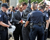 View Photo Gallery: Mayor Vincent Gray, D.C. Council Chairman Kwame Brown (D) and council members Yvette M. Alexander (D-Ward 7), Tommy Wells (D-Ward 6), Muriel Bowser (D-Ward 4) and Michael A. Brown (I-At Large) were arrested by U.S. Capitol Police officers in a protest over the federal budget deal.
